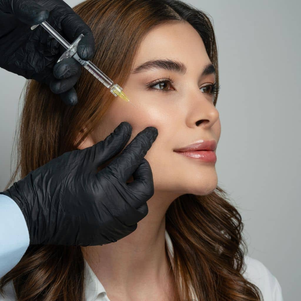 Radiesse calcium hydroxylapatite filler syringe used for facial volume